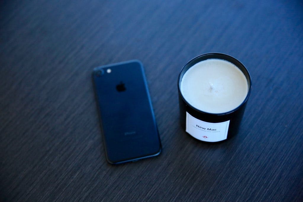 Candle and iPhone
